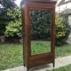 Armoire bonnetière Art Déco à miroir biseauté 1930/1940
