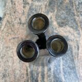 Trio of intertwined bottles signed Paco for O.Frey