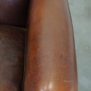 Set of 2 design armchairs made of sheepskin
