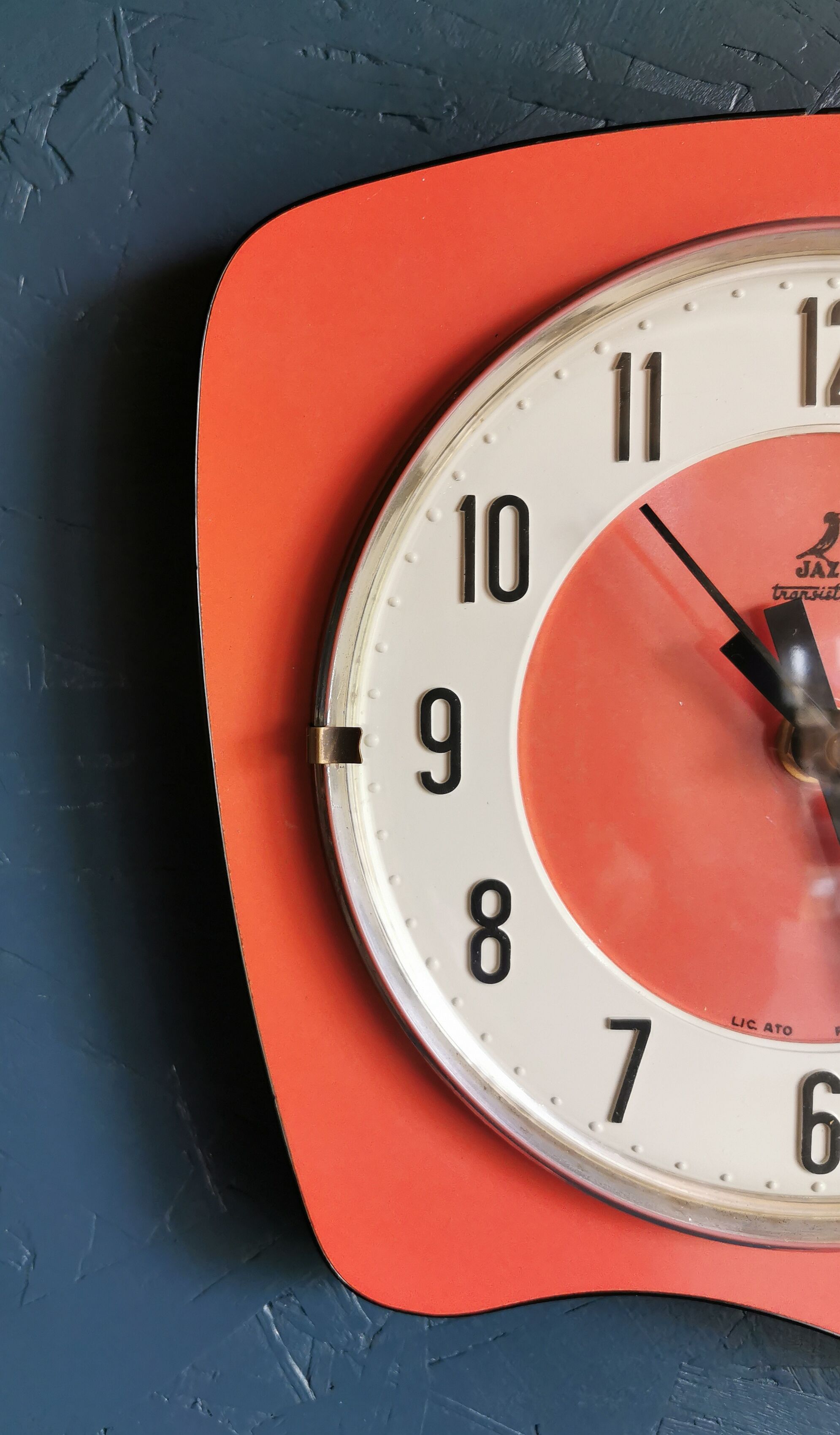 Vintage formica clock asymmetrical silent wall clock "Jaz orange"