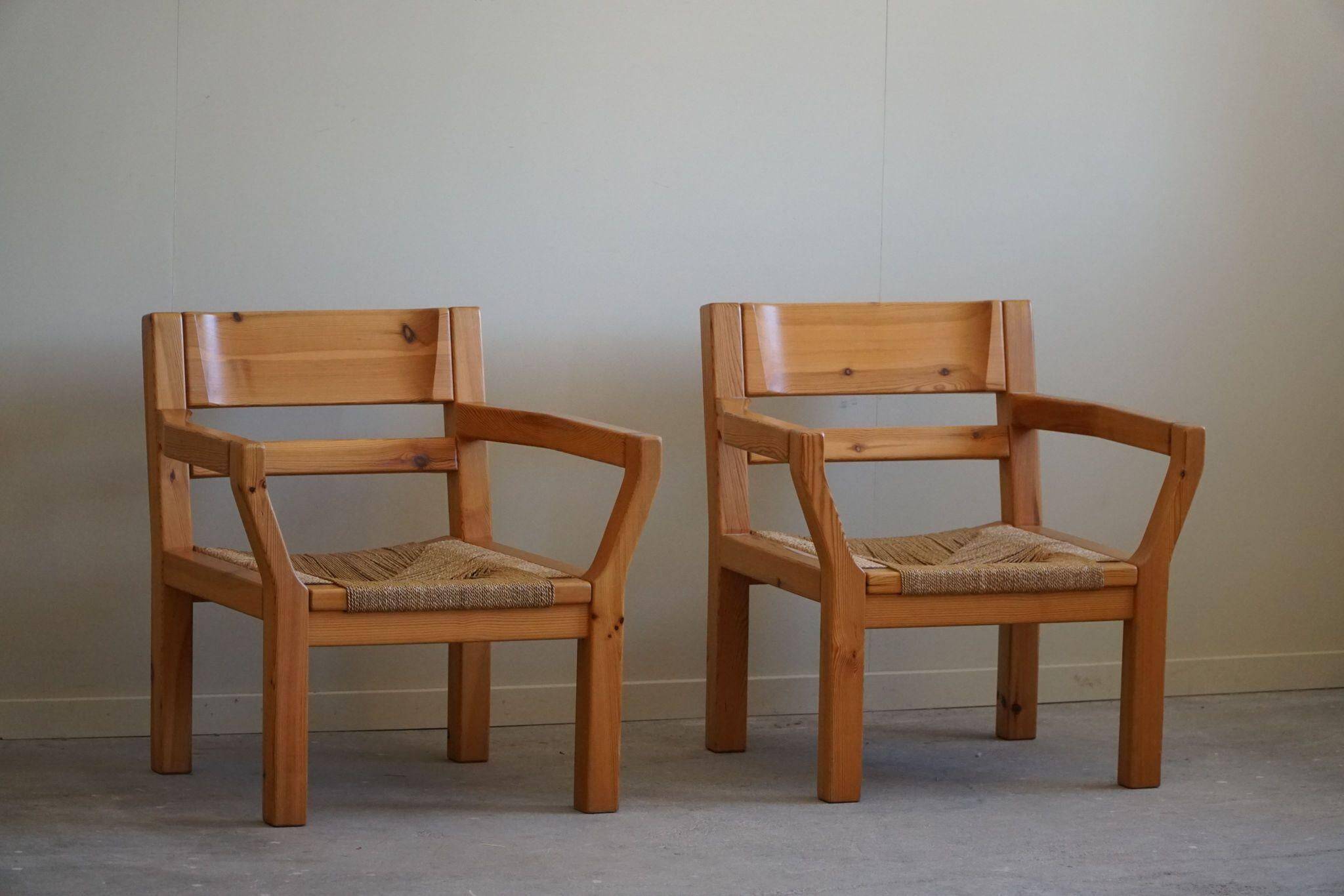Tage Poulsen, a pair of brutalist chairs in pine and cord, Danish modern style, 1970s.