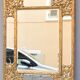 Miroir doré de style régence