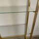 Bookcase in gilded metal and glass, Pierre Vandel Paris, circa 70