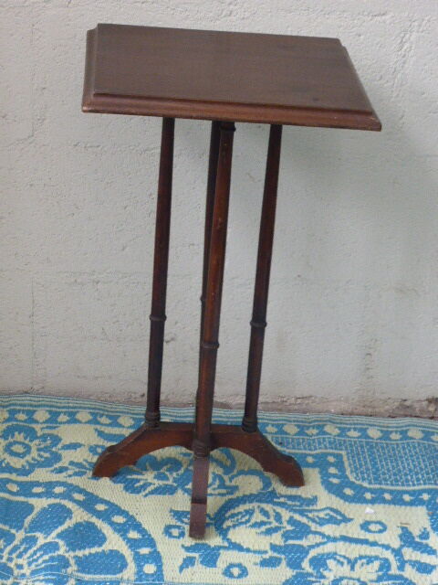 Side table in brown varnished wood