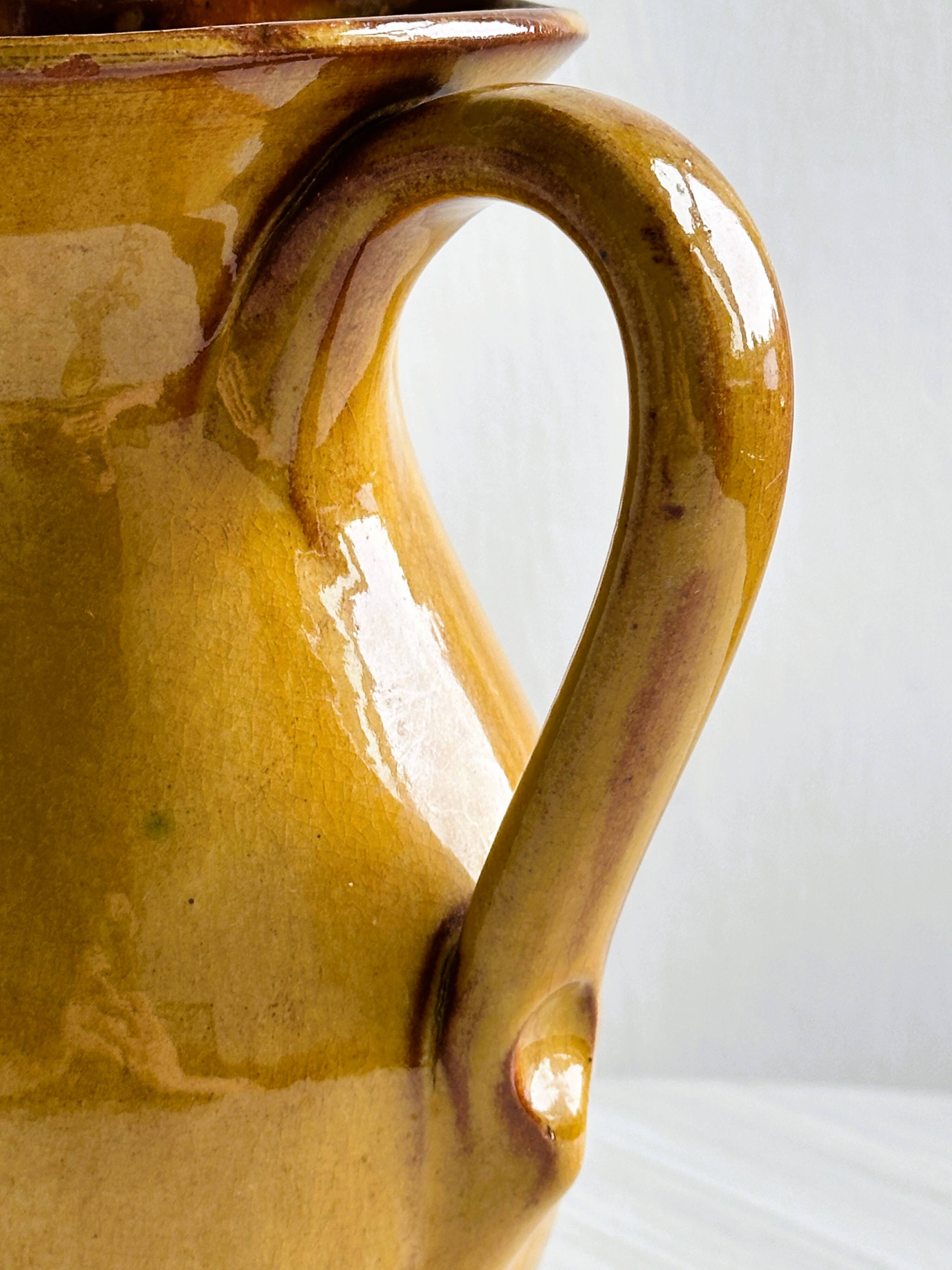 Vintage enameled ceramic pitcher - Retro mustard yellow jar.