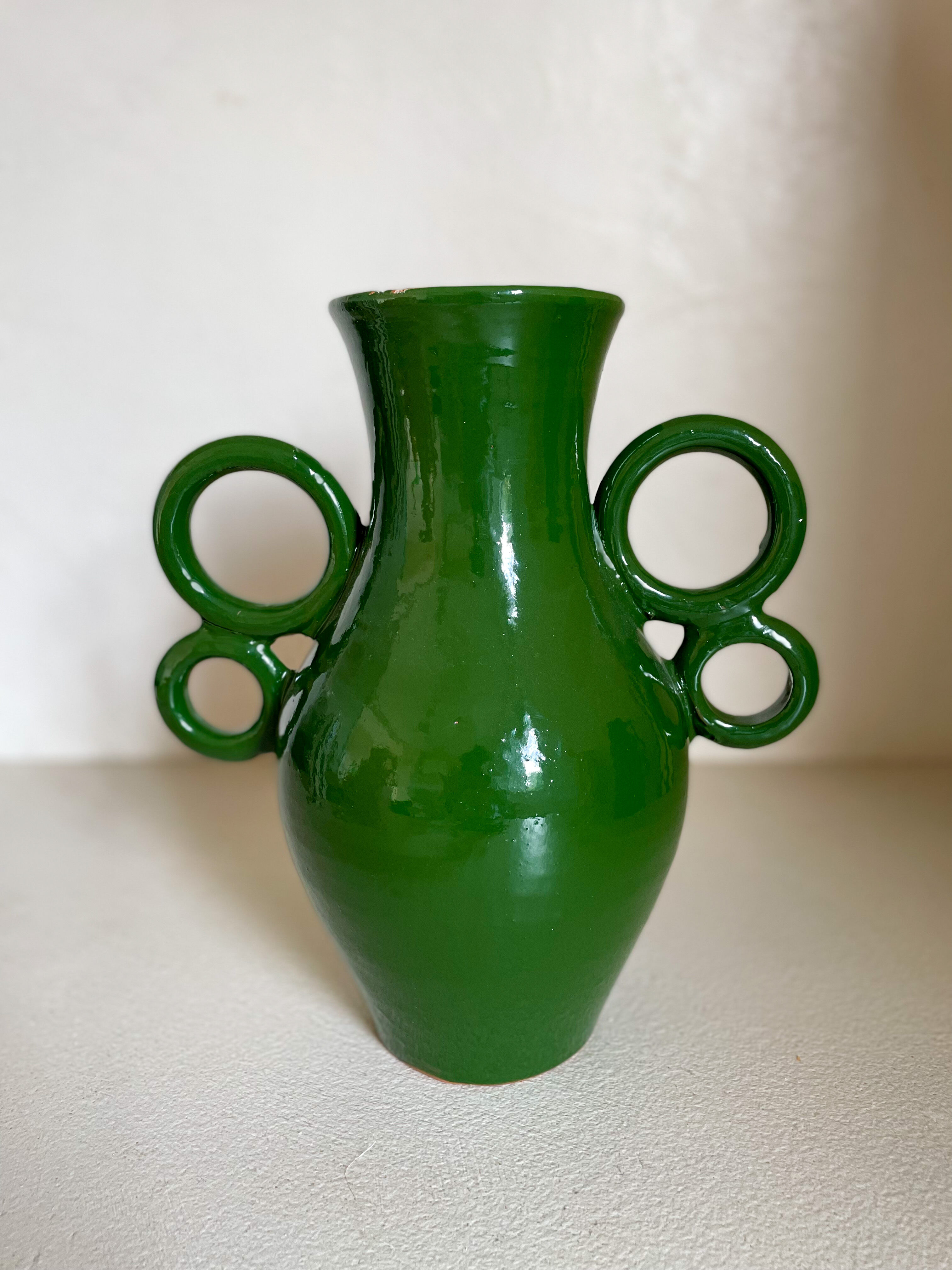Green ceramic amphora vase with large handmade circular handles