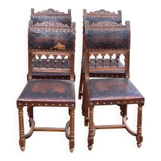4 Henri II chairs in solid wood and leather from the 19th century.