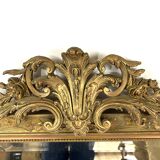 Large rectangular beveled mirror with gold stucco