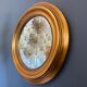 Vintage round gold mirror