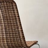 Chair made of rattan, wicker and chrome-plated metal