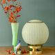 Lampe à poser globe vintage en verre granité vert et doré