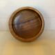 Round wooden pocket emptier