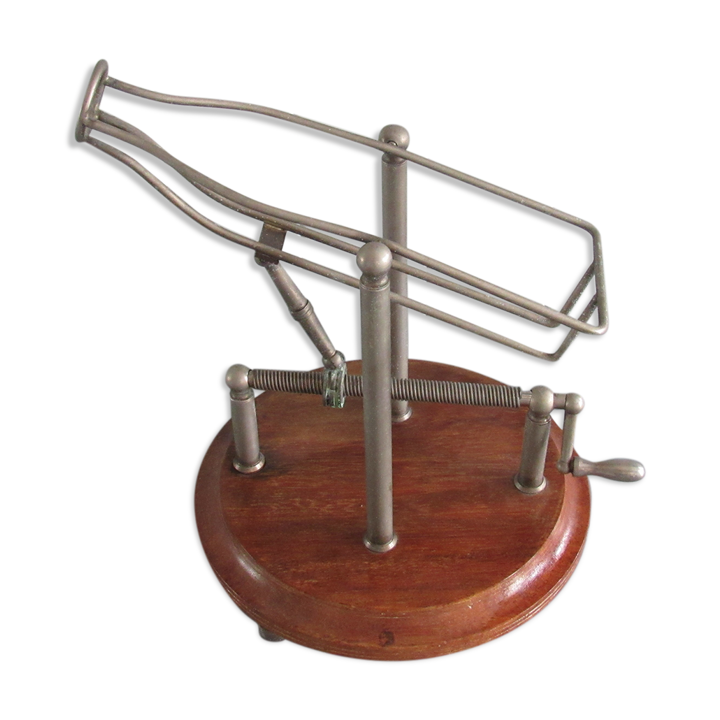 Old mechanical wine decanter on wooden base