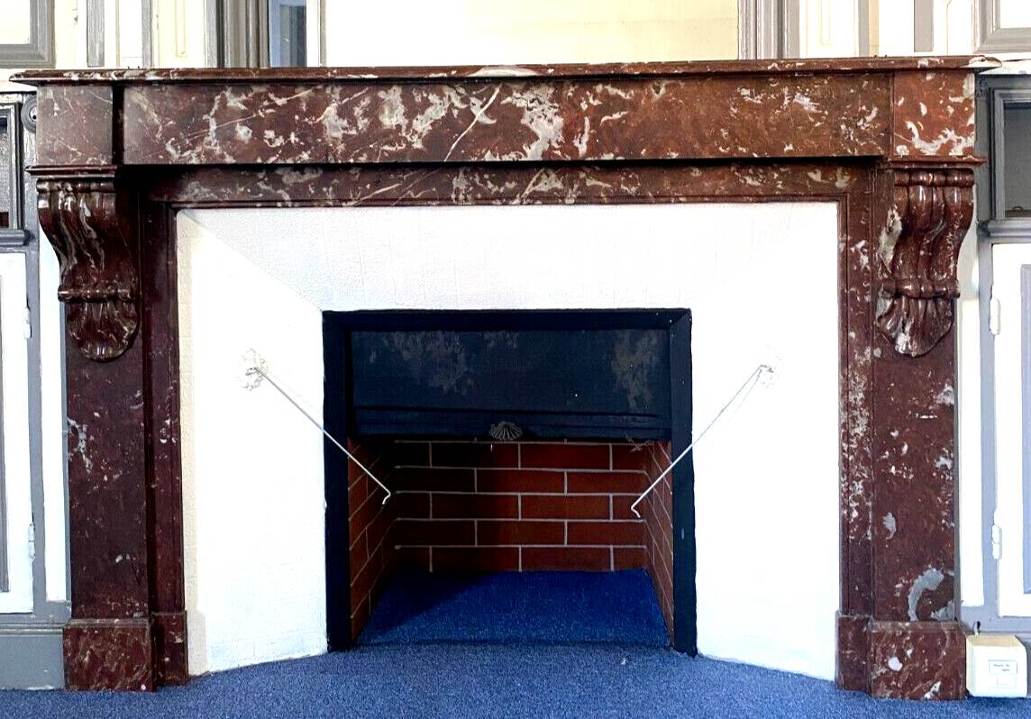 Louis Philippe style fireplace in speckled red marble 20th century