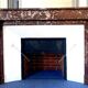 Louis Philippe style fireplace in speckled red marble 20th century
