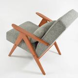 KOMPAS armchairs in grey and white.