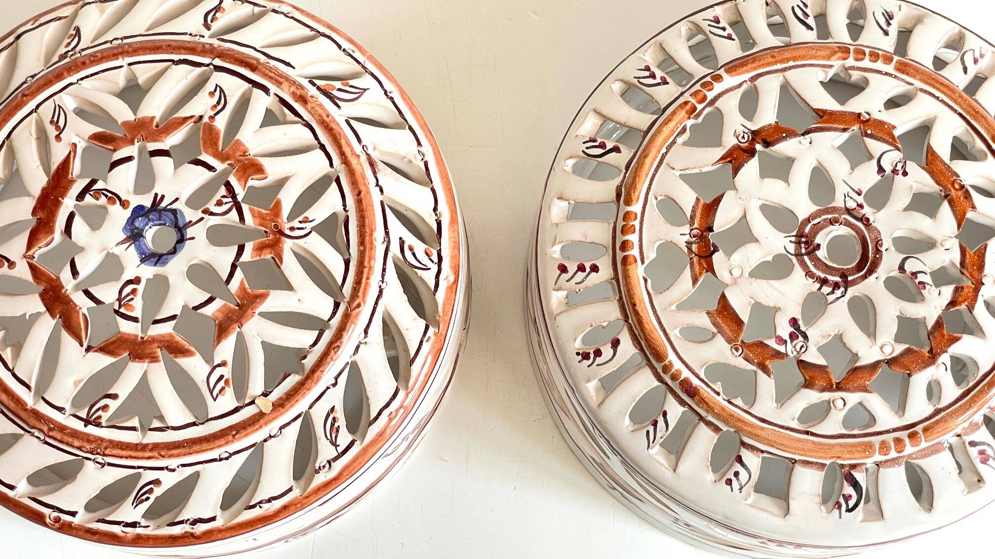 Handmade terracotta wall lamp with blue enamelled center