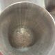 Footed glass in pewter