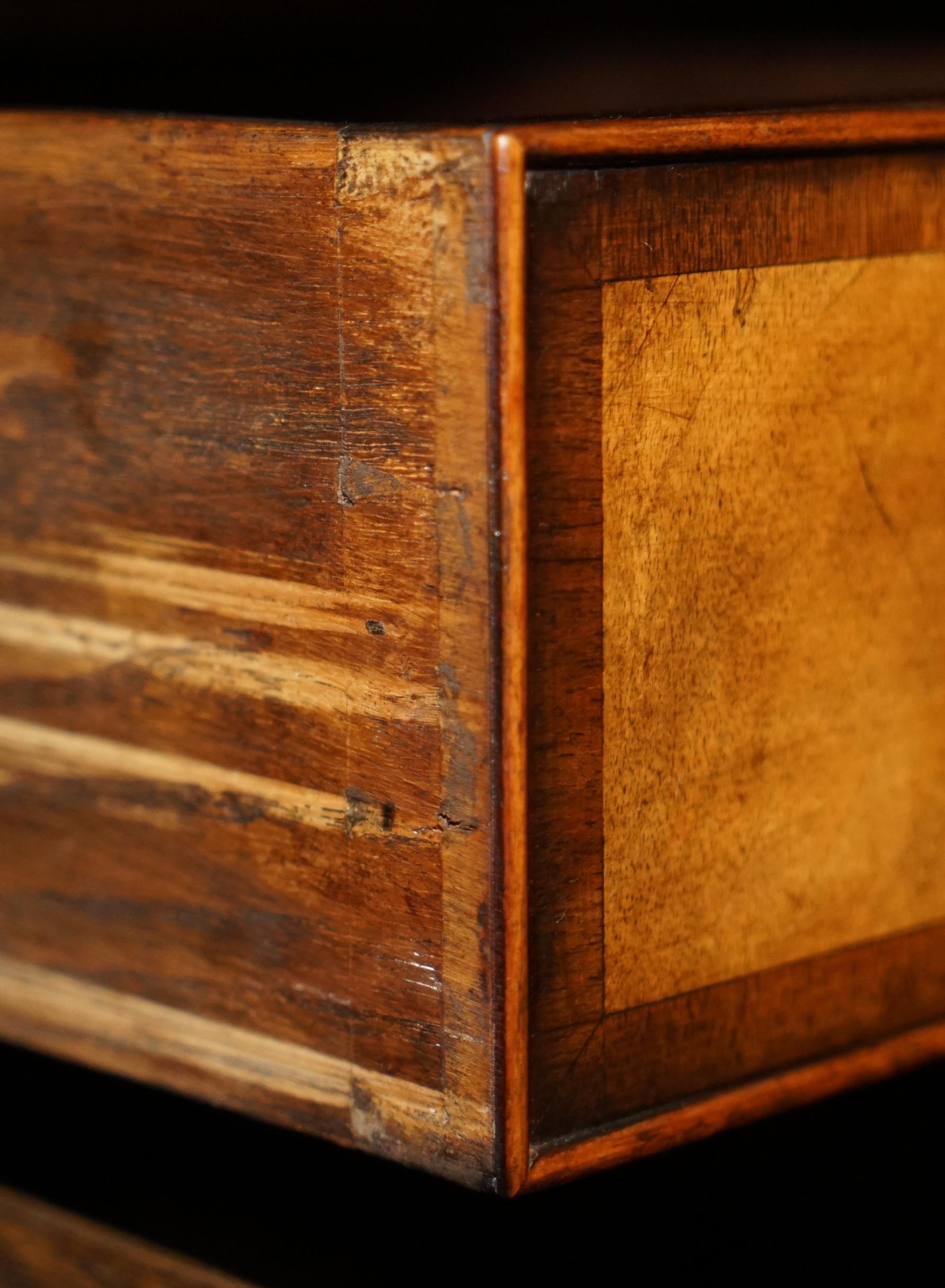 Victorian antique partner's desk in veined walnut with a leather top.