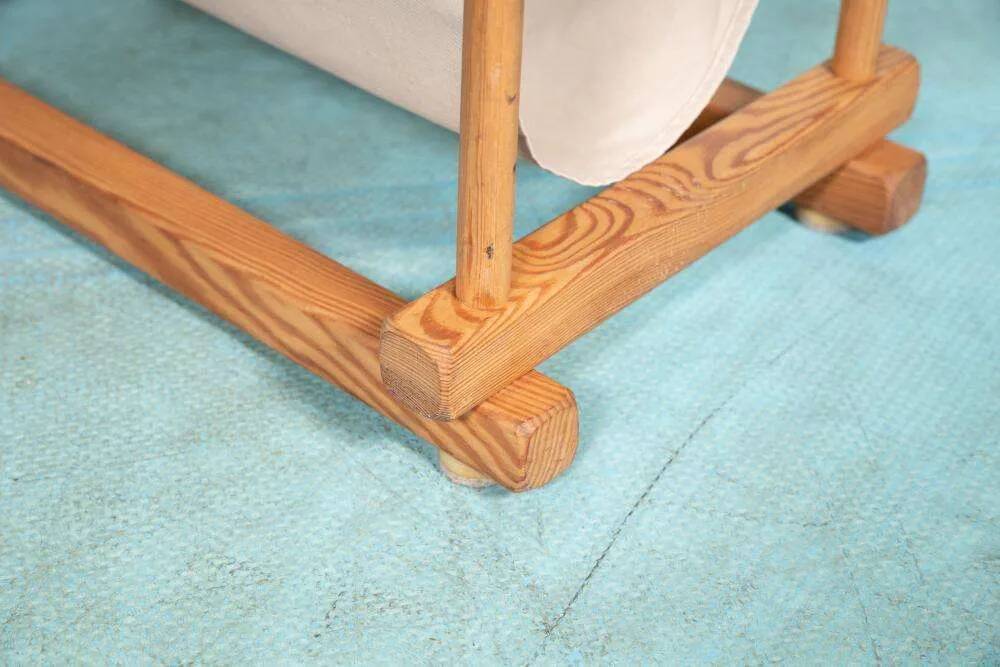 Bohemian magazine rack in vintage 70s pine style.