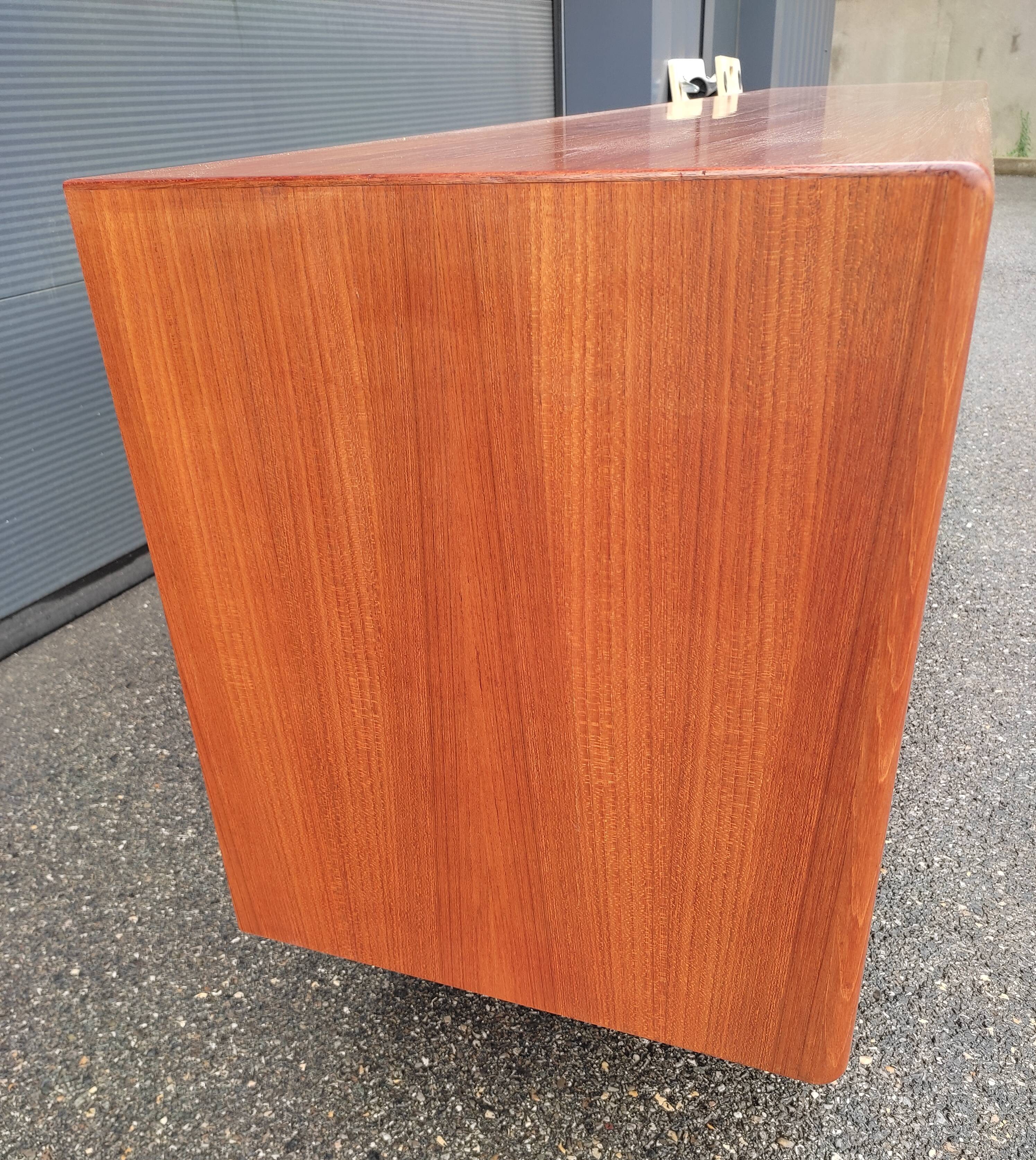 Scandinavian teak row by Axel Christensen for ACO Mobler