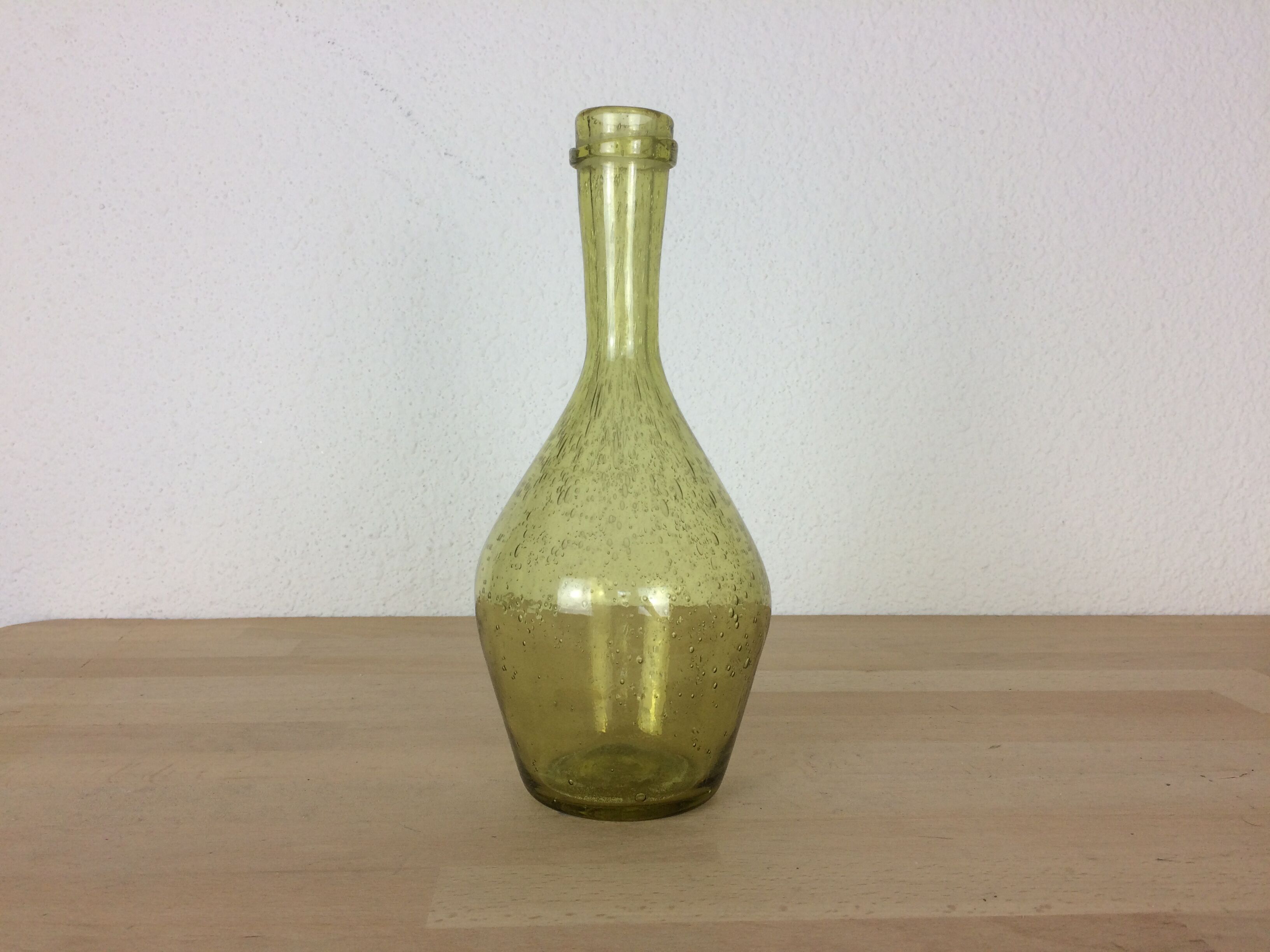Green bubbled glass vase
