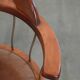 Set of 2 swivel/office chairs with a cognac-coloured cow leather seat