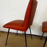 Paire de chaises en skaï orange