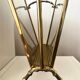 Gold-plated brass magazine rack Maison Baguès