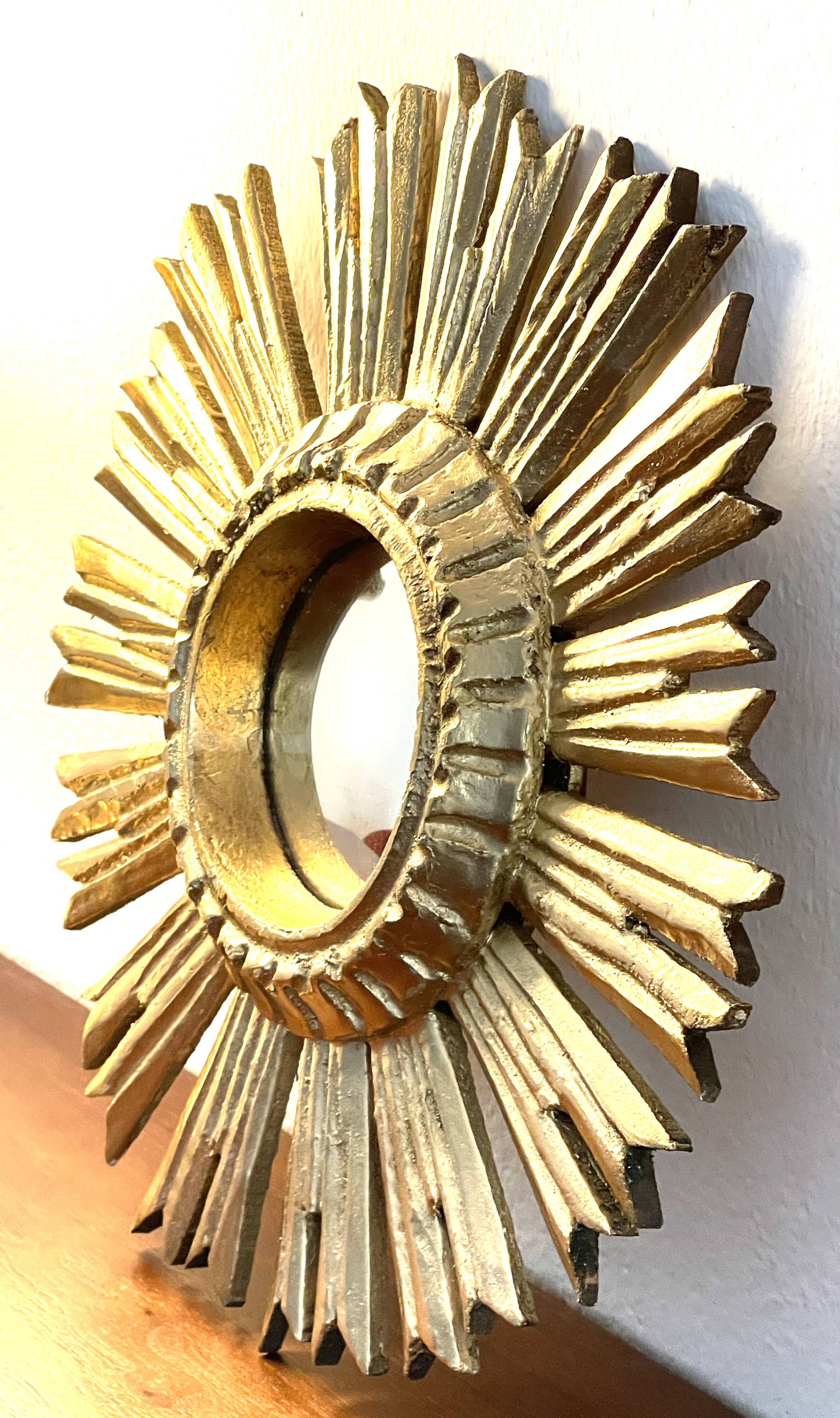 Miroir soleil en bois doré « œil de sorcière »