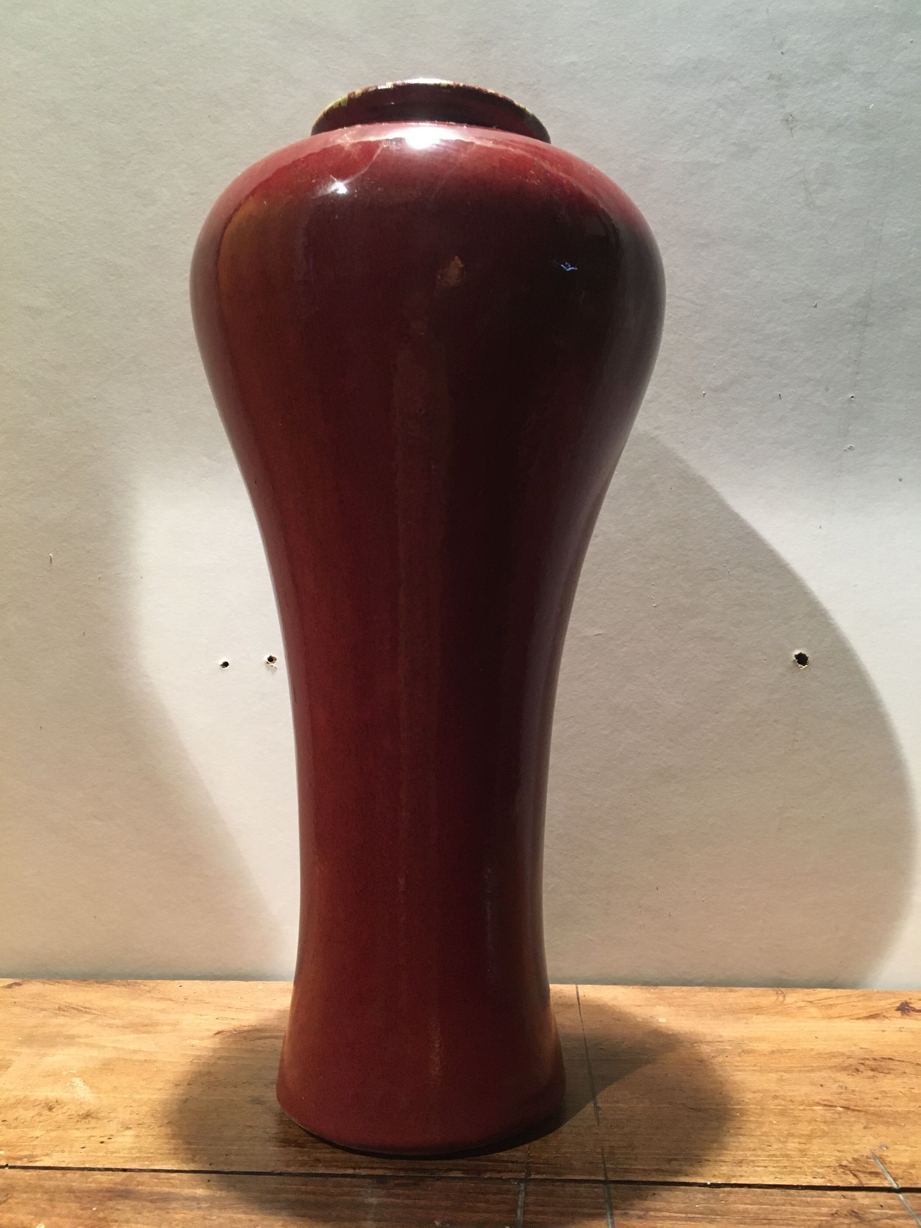 Red ceramic vase