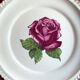 Decorative plate Harker with a red rose in the centre and a 22-carat gold border.
