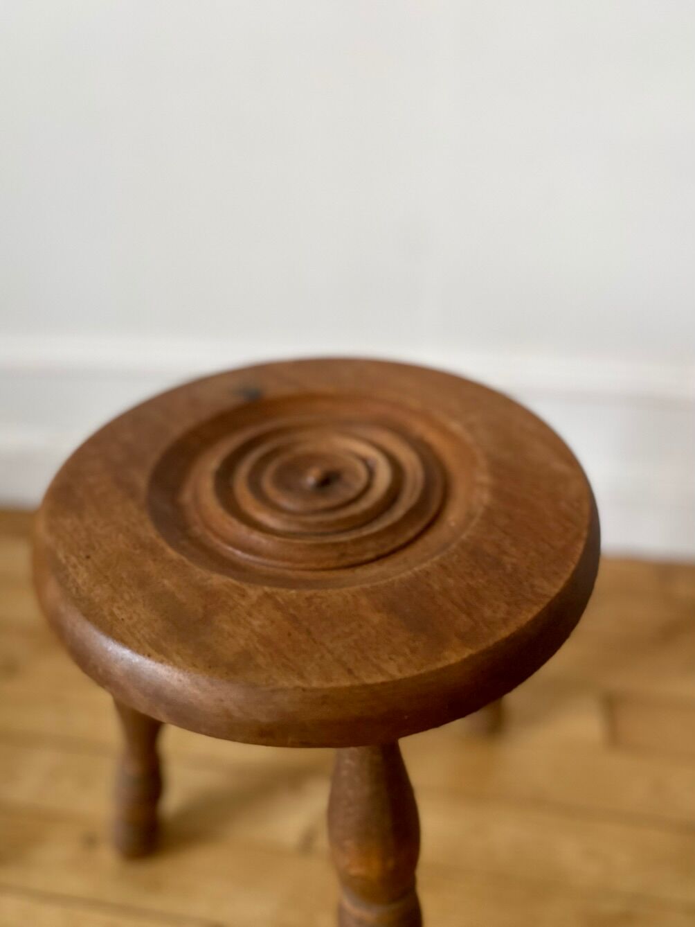 Wooden tripod stool