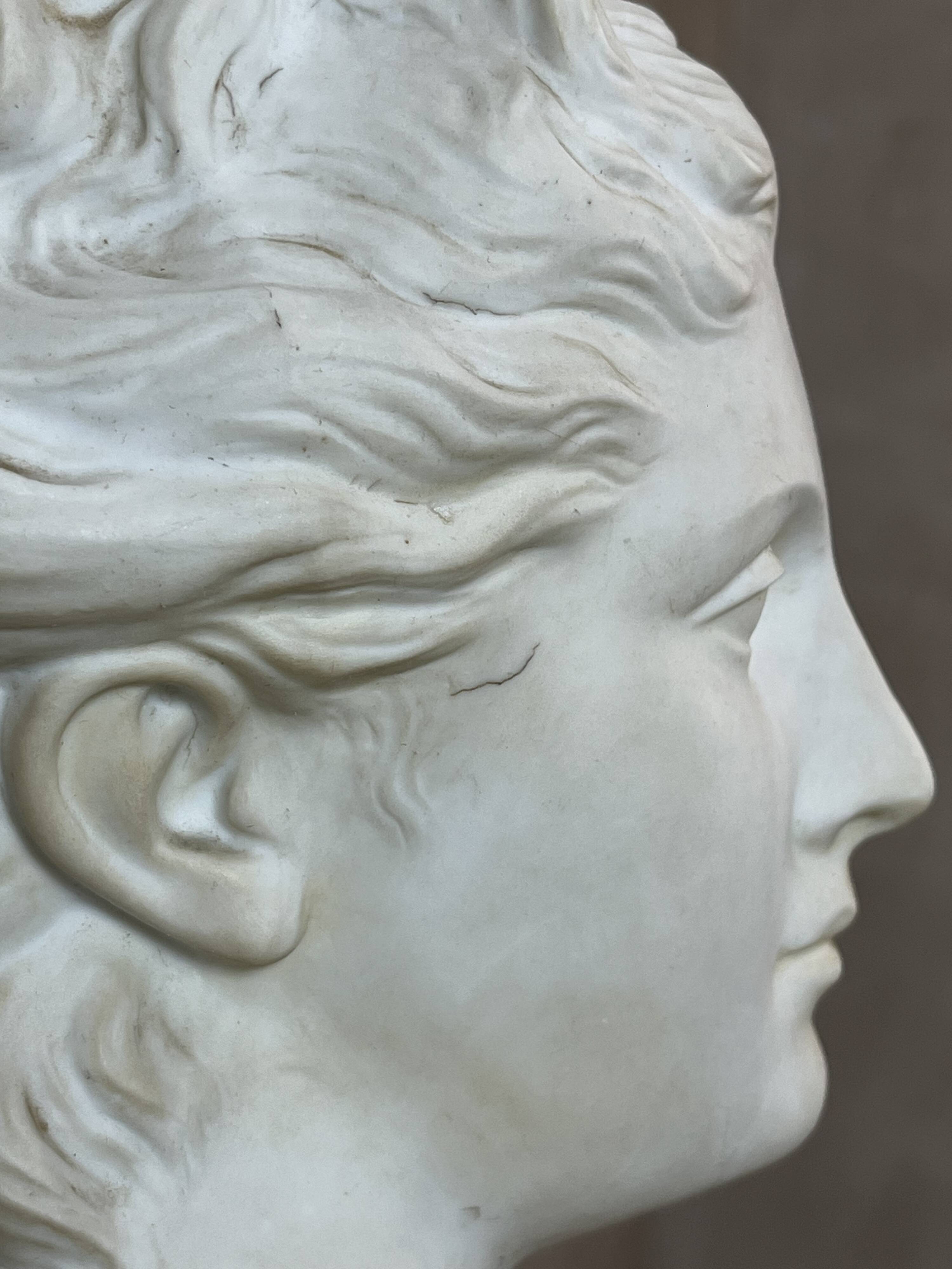 Bust of a woman in Biscuit signed