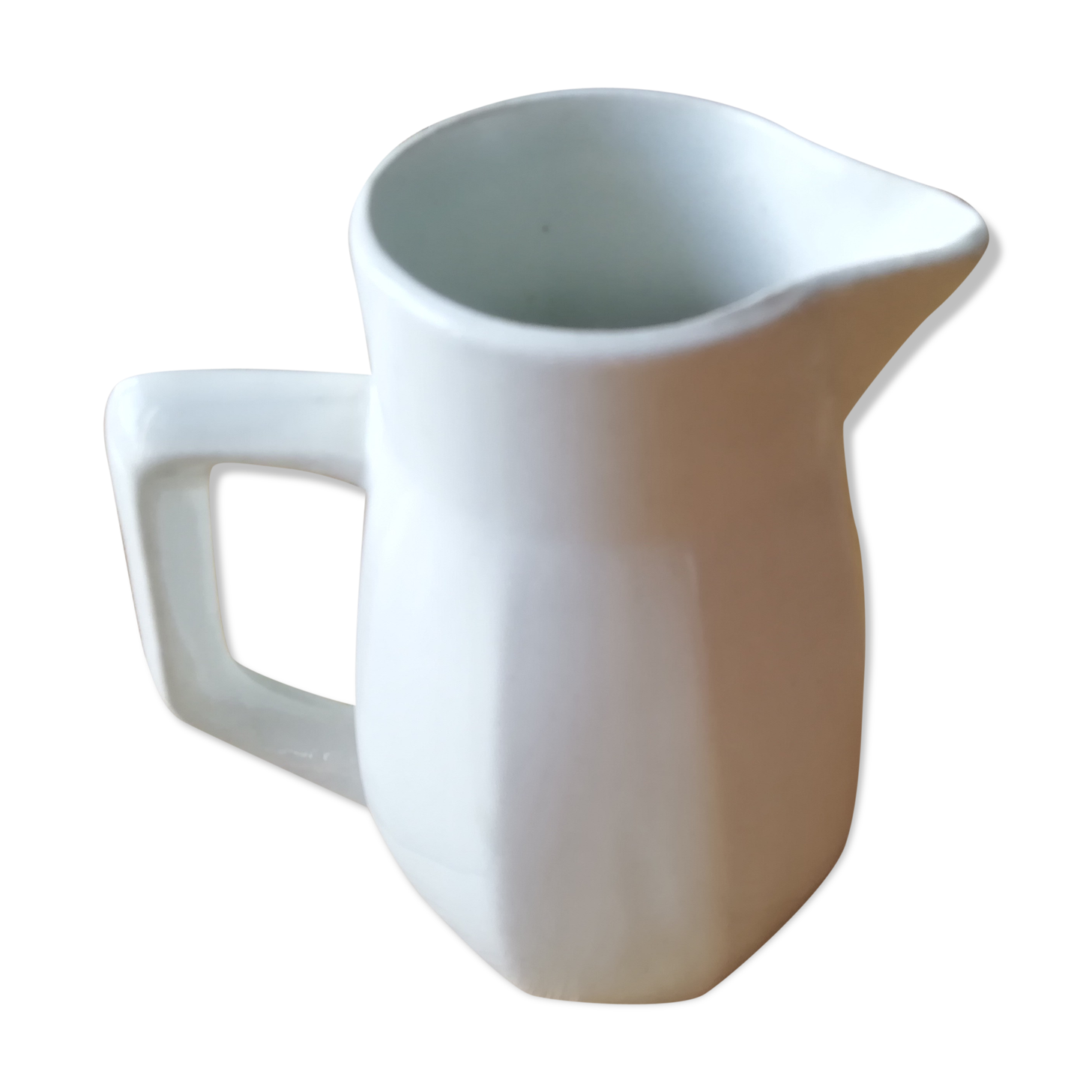 White porcelain milk pot