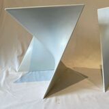 Pair of unmarked triangular white design stools