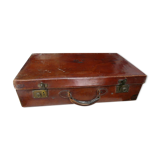 Old monogrammed leather travel suitcase and barony crown