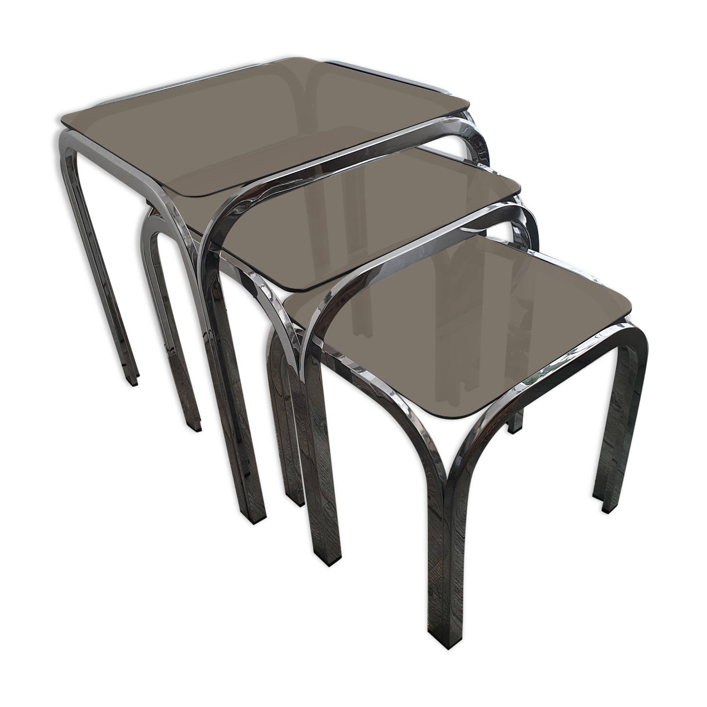 Trundle table in tubular steel and smoked glass