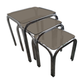 Trundle table in tubular steel and smoked glass