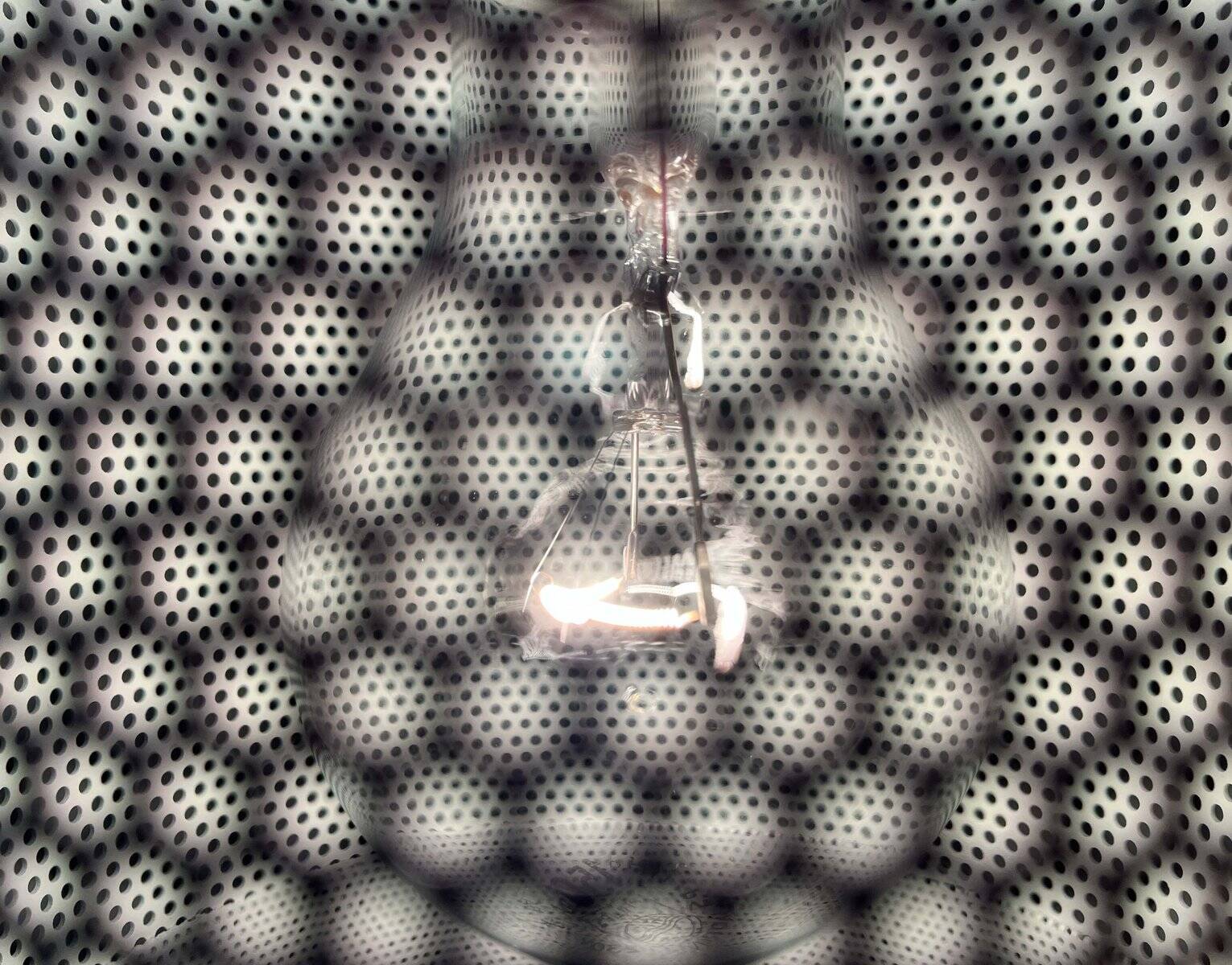 Minimalist perforated metal pendant lamp by Orno, Finland.