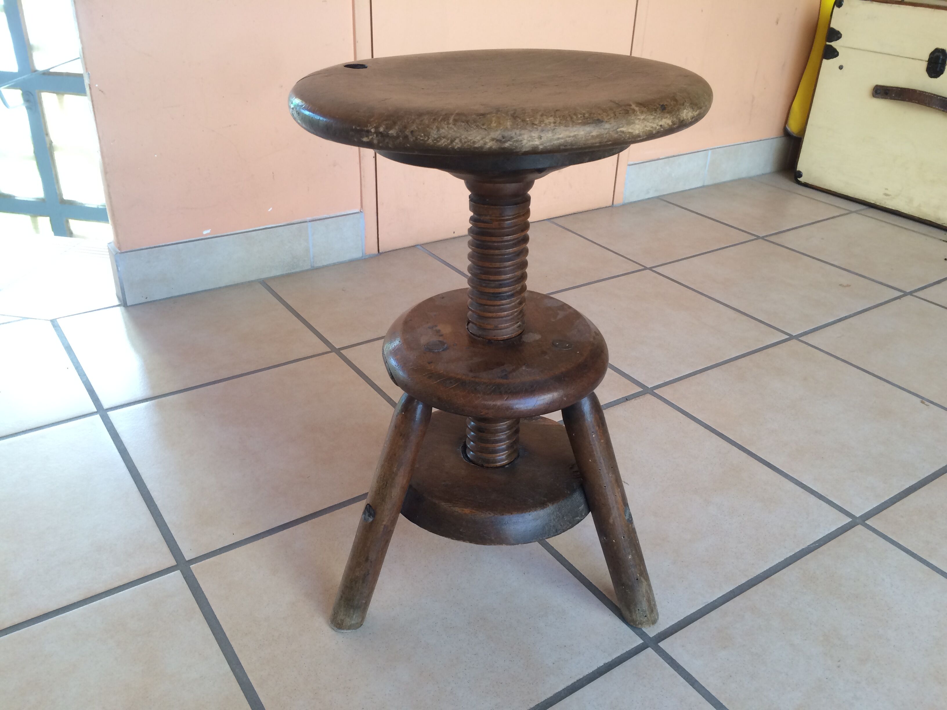 Old solid oak stool adjustable in height 50