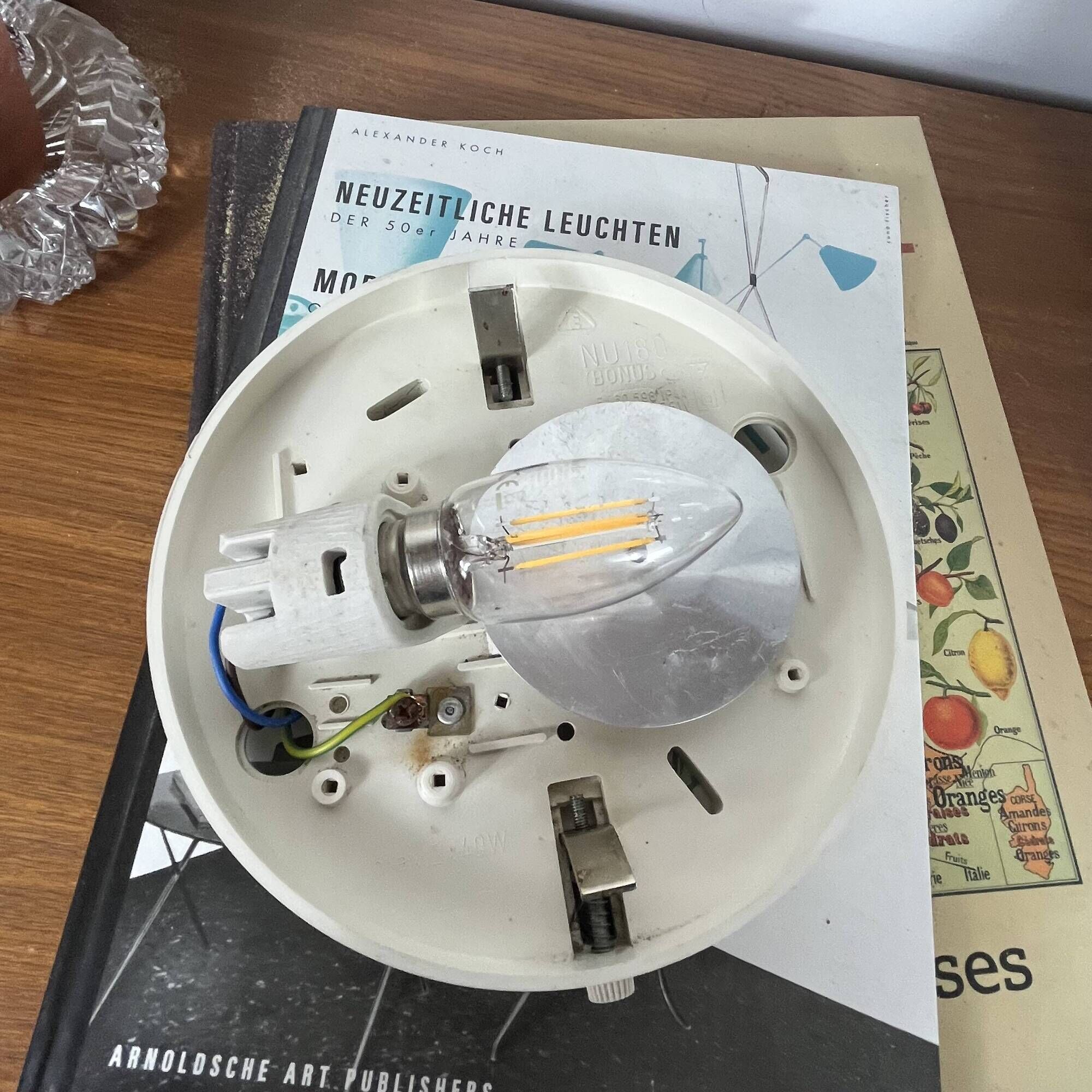 Large round wall lamp ceiling light in transparent vintage glass from the 1970s.