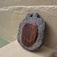 Brutalist mirror in hand-carved natural stone