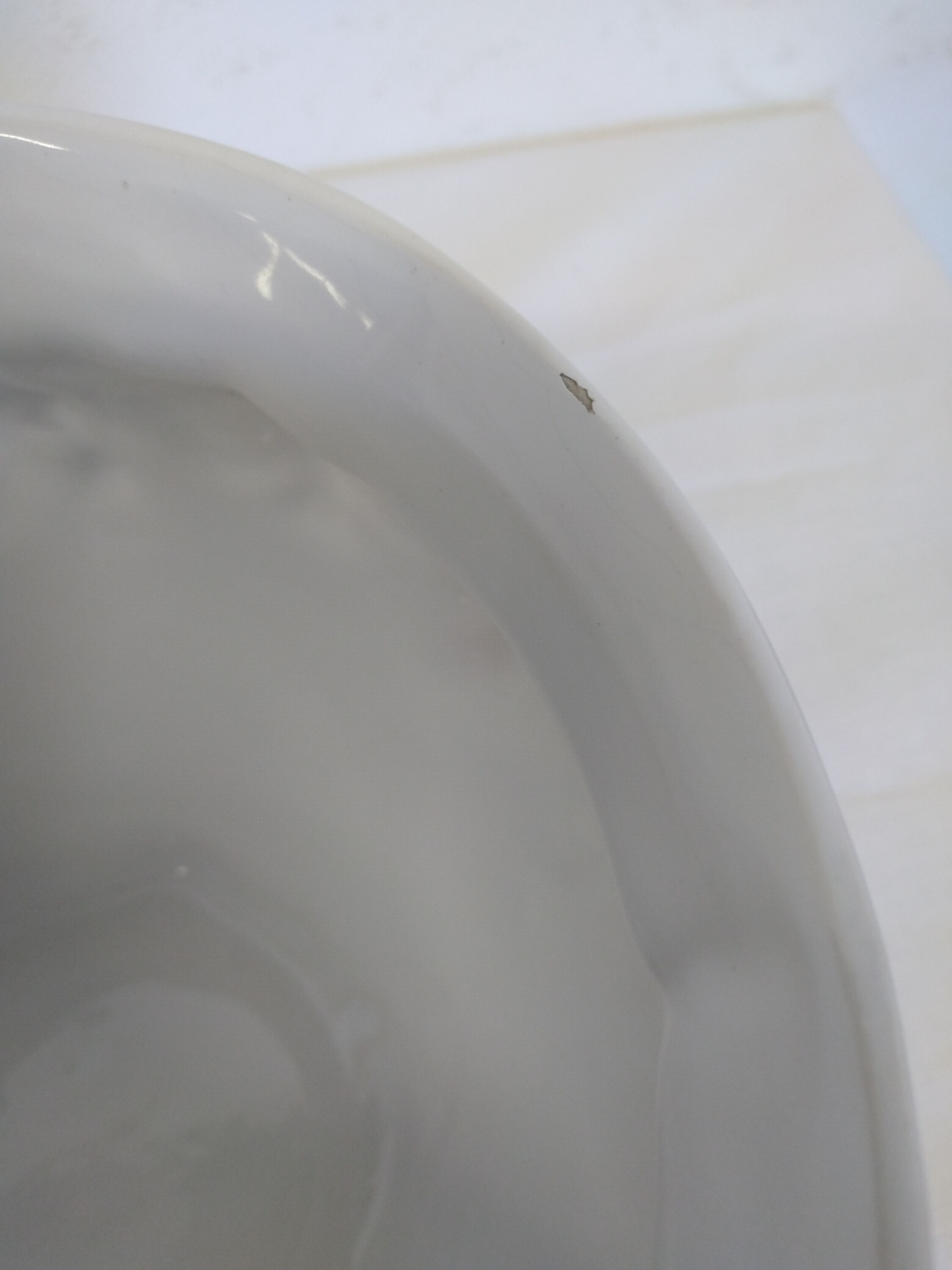 Old pot cover in slip