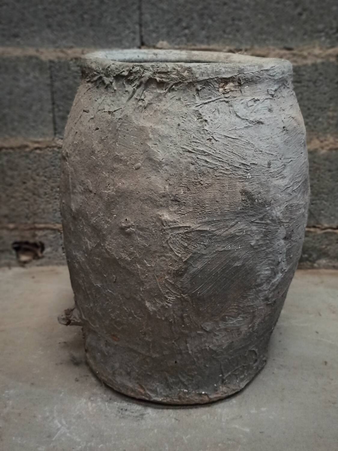 Old gray terracotta pot