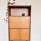 Wood veneer secretary from the 1970s.