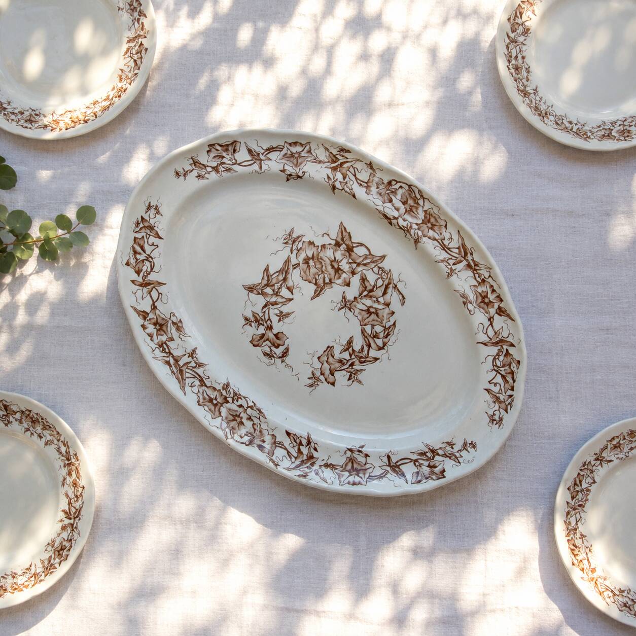 Oval dish from the 19th century in ironstone signed Longchamp "Liserons"