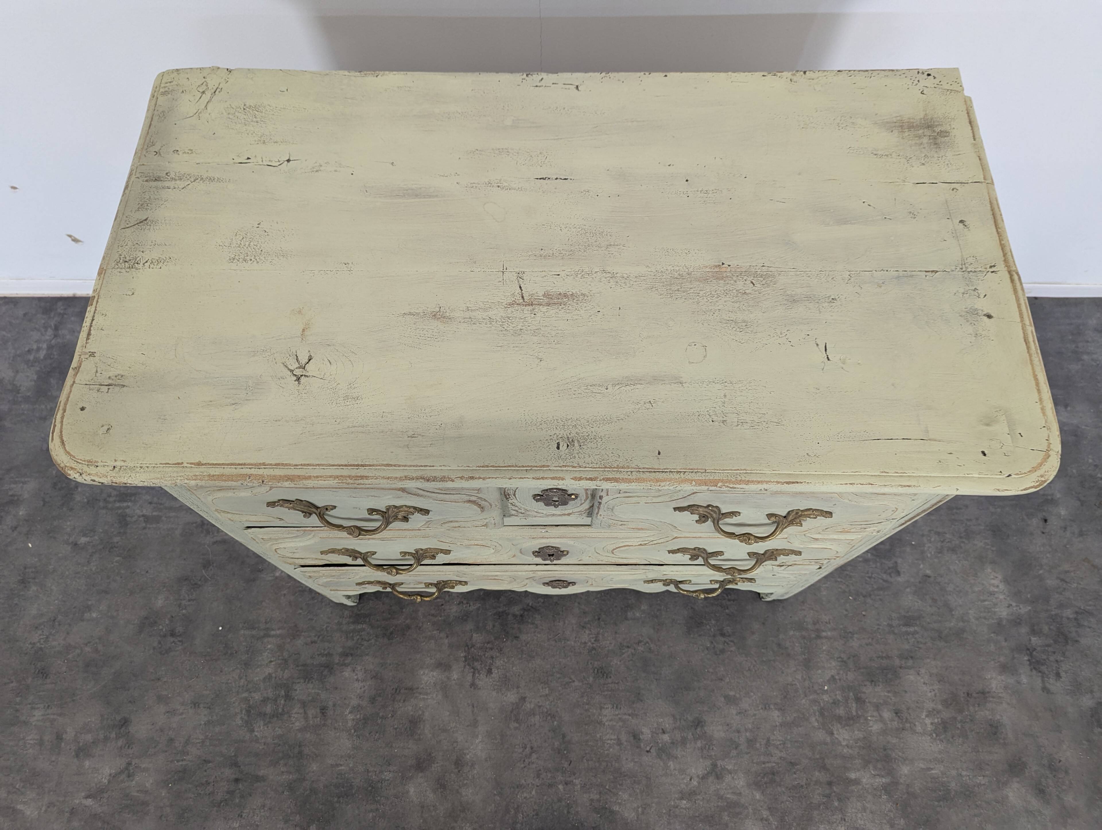 Louis XIV period chest of drawers with repainting