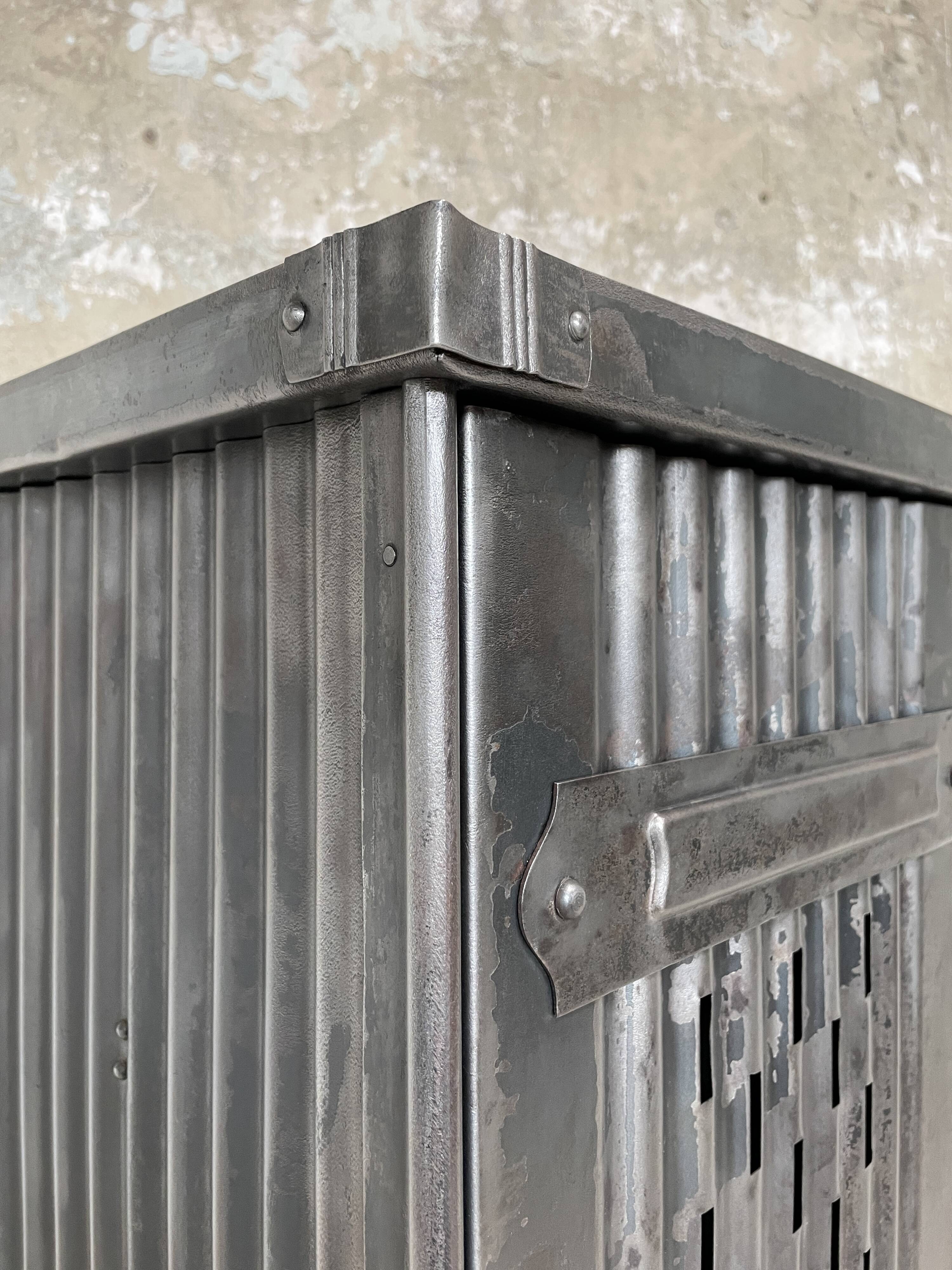 Strafor double-door corrugated iron cloakroom, circa 1920.