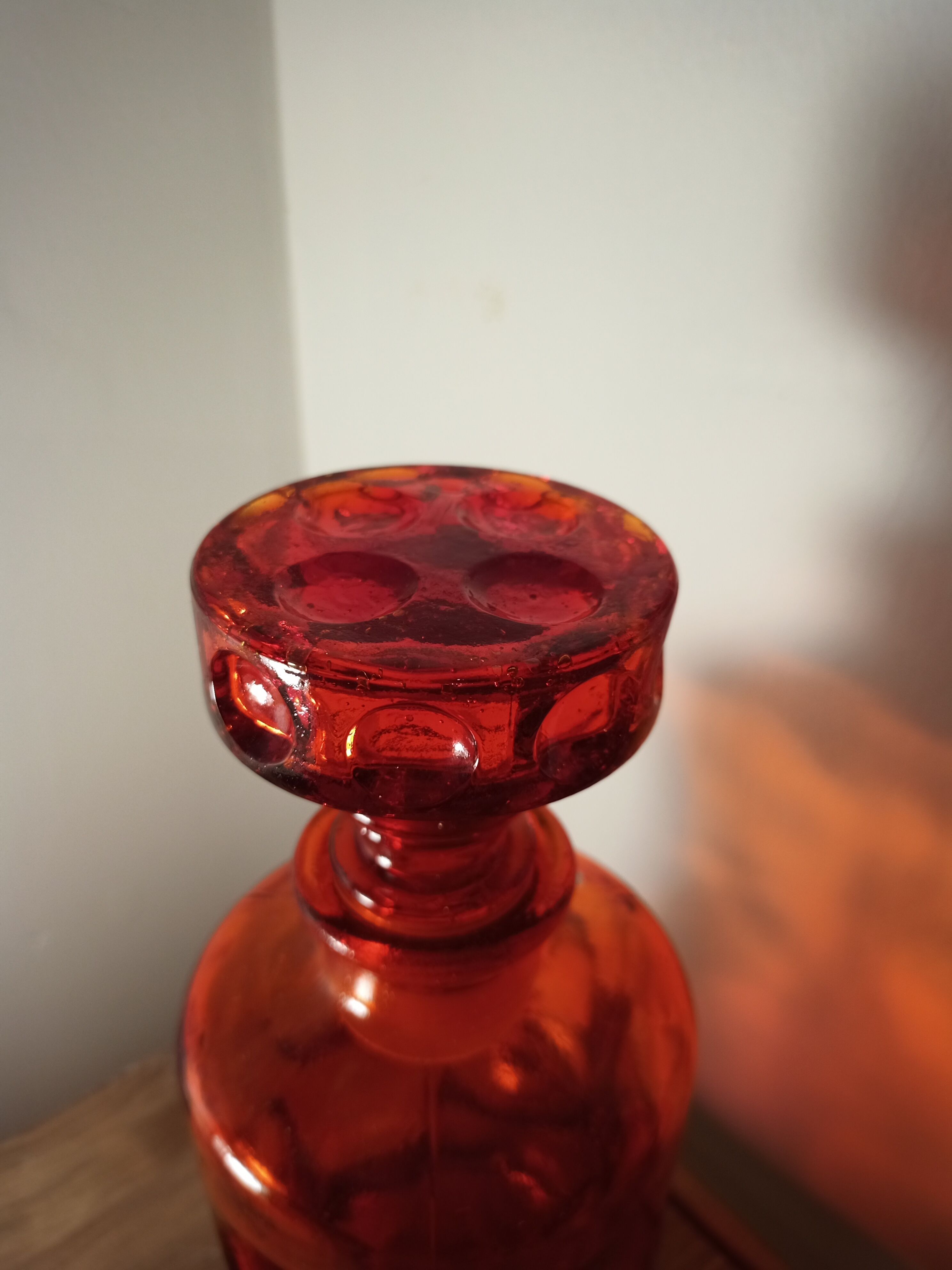 Red carafe with molded glass with hollow bubbles